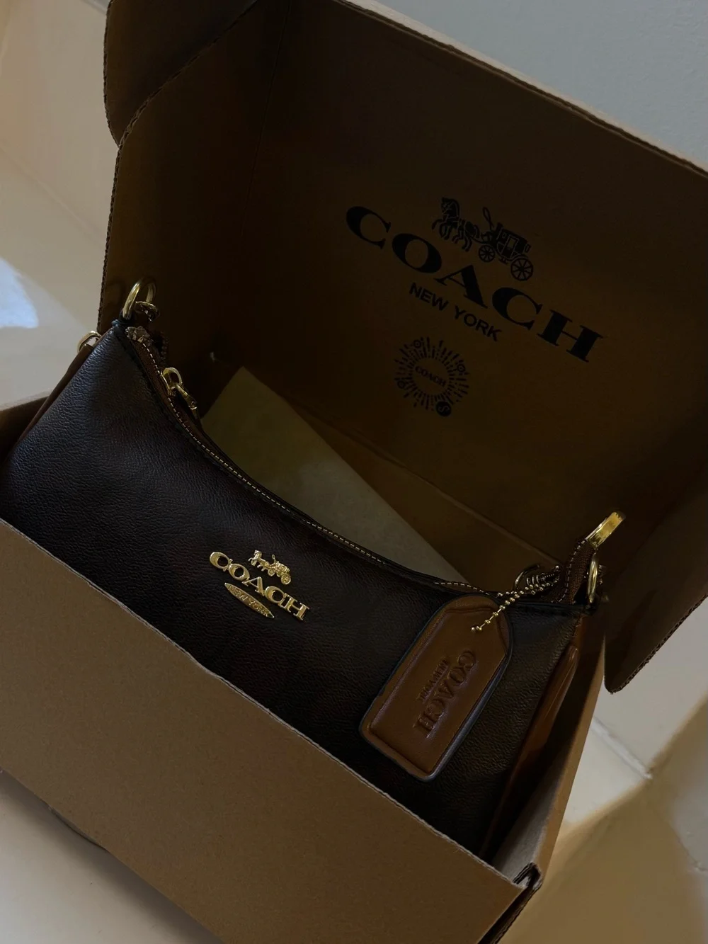 Coach Brown Leather Wristlet with Gold Hardware
